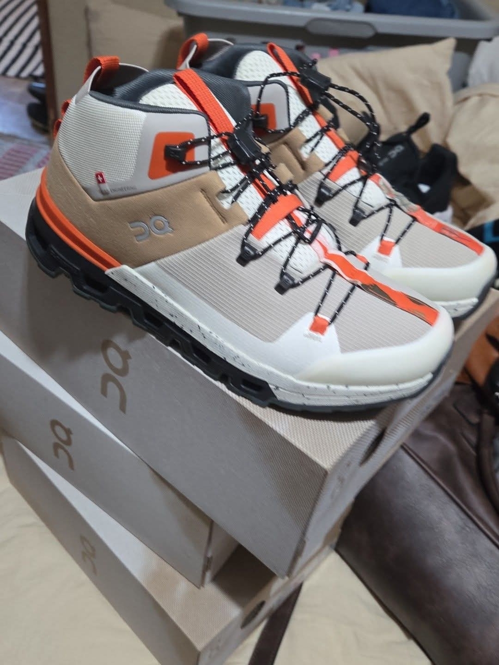 On Clouds Running Men’s Beige and Orange Athletic Trail Shoes